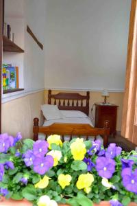 A bed or beds in a room at Nonna Murtas