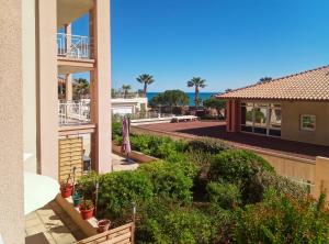 a view from the balcony of a house at Appartement Cap Hermès in Fréjus