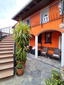 a building with stairs and plants in front of it at penzion U Hájků in Křepice