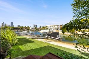 a boat docked at a marina in a city at Bluewater Oasis - Stay 4 Pay 3 in Gold Coast