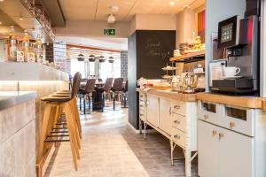 Kuchyň nebo kuchyňský kout v ubytování Hotel Boehler
