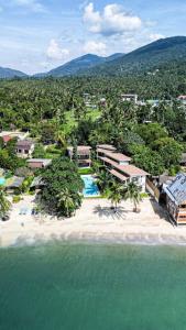an aerial view of a resort on a beach at Happy Home kpg in Ko Phangan