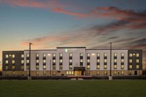 a rendering of the front of a building at WoodSpring Suites Palmdale - Lancaster in Palmdale