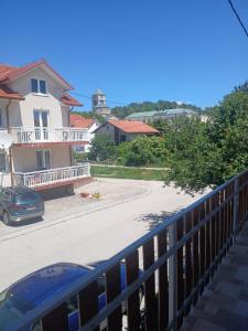 a car parked on a balcony of a house at Luce in Tomislavgrad