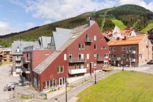 an aerial view of a town with a mountain at Åre Travel - Åre Parken 18 in Åre