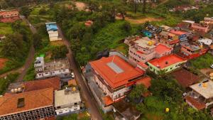 an overhead view of a small town with houses at Laalis crest Coorg Madikeri in Madikeri
