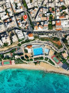 an aerial view of a resort on a beach at BeachBox in Piraeus