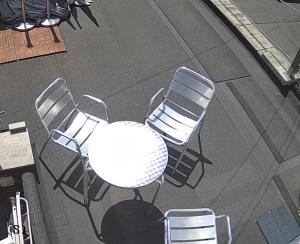 an overhead view of a white table and chairs at M Studio in Raynes Park
