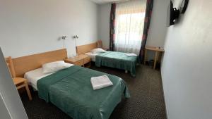 a hospital room with two beds and a window at Zemgale in Jelgava +46 photos
