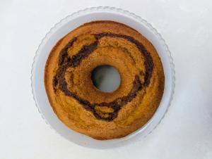 a bundt cake on a plate on a table at Hotel Del Sole in Sora
