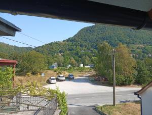 a view of a parking lot with cars parked at Studio apartman Topolovec in Krapina