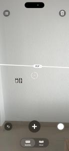 a white ceiling with black stickers on it at Apto no centro in Nova Mutum