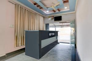 an office with a reception desk in a room at Hotel O Star Inn in Hyderabad