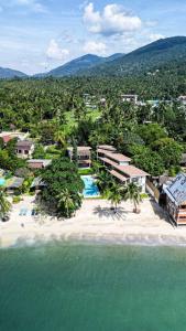 an aerial view of a resort on a beach at Beachfront Dream in Ban Tai in Ban Tai