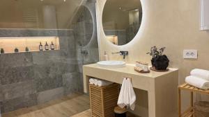 a bathroom with a sink and a shower at Nikola apartman in Arilje +9 photos
