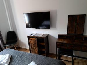 Televisor o centre d'entreteniment de Pod Dachem Tykocin 1