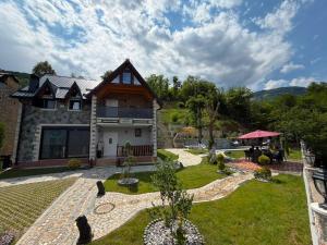 an aerial view of a house with a garden at Villa Bushati in Tropojë