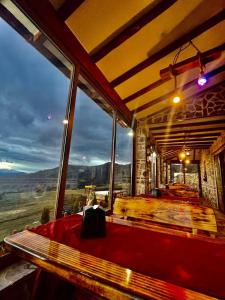 a room with a bed and a large window at SRC Bella Casa in Ohrid