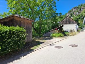 a couple of buildings on the side of a road at La Vie Est Belle in Salles-la-Source +3 photos