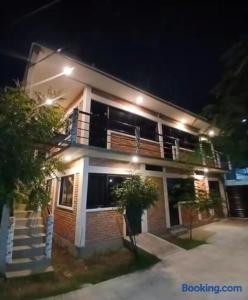 a house with lights on top of it at night at Villas La Vista in Tuxpan de Rodríguez Cano