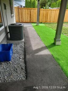 a yard with a trash can next to a house at Private 2 bedroom suite close to everything! in Maple Ridge