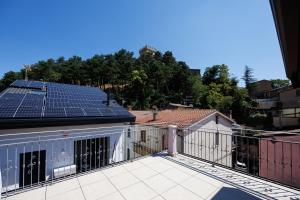 a balcony with solar panels on top of a house at B&B Alba in Celano +18 photos