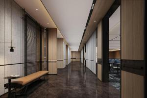 a hallway with a bench in a building at Four Points by Sheraton Guilin Central in Guilin +10 photos