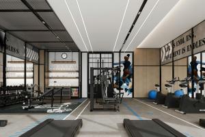 a gym with treadmills and people on a treadmill at Four Points by Sheraton Fuzhou Changle in Fuzhou