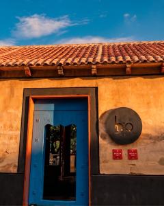 a building with a blue door and a sign on it at Hotel Bo in San Cristóbal de Las Casas +94 photos