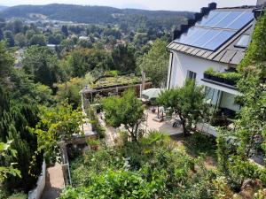 an aerial view of a house with a garden at Wohnung in einer kleinen Burg in Neunkirchen