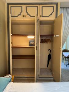 a bedroom with a bunk bed with a closet at Appartement Wassim - Gueliz in Marrakesh