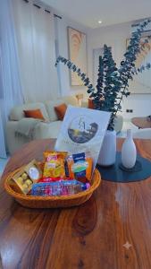 a basket of food on a table in a living room at Elegance appart-Yoff virage in Dakar +7 photos