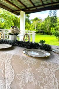 a table with two plates on top of it at Cazabela in Casisang