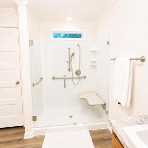 a white bathroom with a shower and a sink at Beautiful, Cozy home in Concord in Concord +27 photos