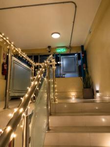 a set of stairs with lights in a building at Residencial Turístico Rio Guayas in Guayaquil