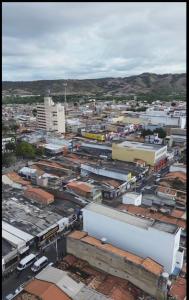 an aerial view of a city with buildings and trains at Central in Juazeiro do Norte