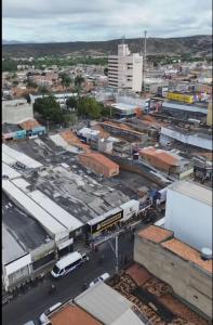 an aerial view of a city with a train at Central in Juazeiro do Norte