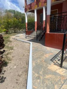 a building with a white line on the side of it at Private Executive Master Suite - Parham, Antigua in Vernons +1 photo