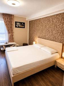 เตียงในห้องที่ DNY Comfort Apart
