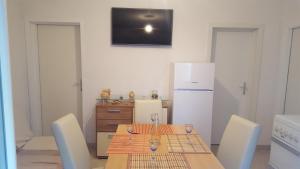 Kuchyň nebo kuchyňský kout v ubytování Holiday House Popovic