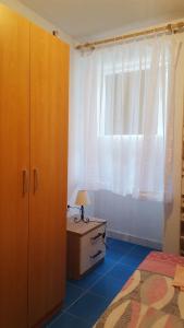 Postel nebo postele na pokoji v ubytování Holiday House Popovic