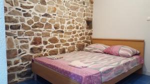 Postel nebo postele na pokoji v ubytování Holiday House Popovic