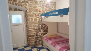 Postel nebo postele na pokoji v ubytování Holiday House Popovic