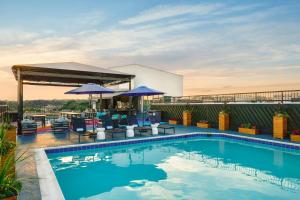 a swimming pool on the roof of a building at The Ven at Embassy Row, Washington, D.C., a Tribute Portfolio Hotel in Washington, D.C.