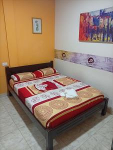 a bedroom with two beds in a room at Hotel capital in Florencia