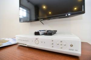 TV a/nebo společenská místnost v ubytování Union Street Apartment
