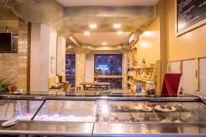 a display case in a restaurant with food on display at Hotel Tibet International in Kathmandu