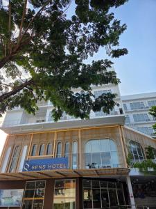 a building with a sign that reads saving hotel at SENS Hotel Nonthaburi Bangbuathong in Nonthaburi