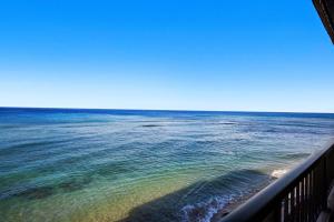 a view of the ocean from a balcony at Maui Kai 405 in Honokowai