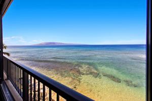 a view of the ocean from a balcony at Maui Kai 405 in Honokowai